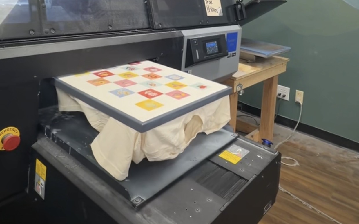 A proof sheet printing onto a garment on our own press